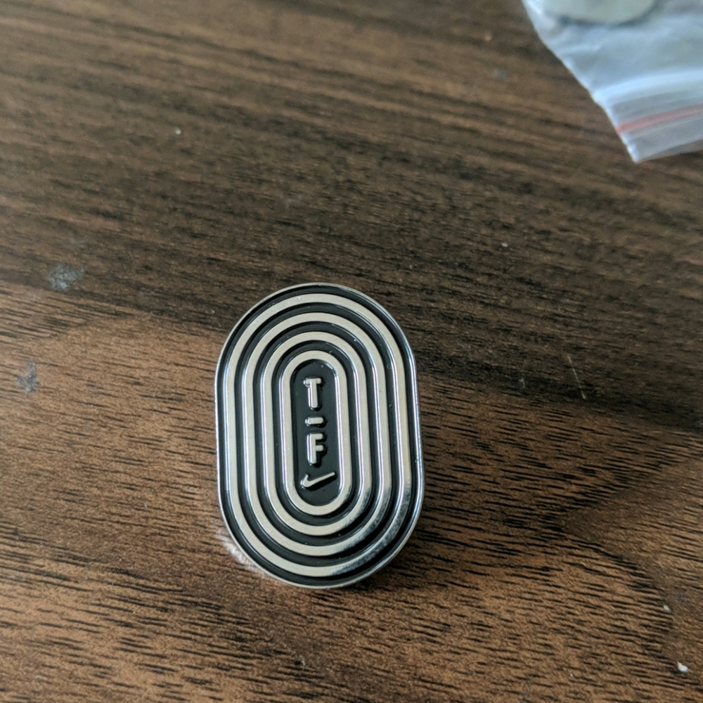 Nike Track and Field Pin